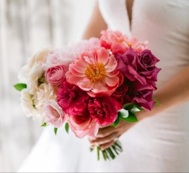 Bridal bouquet with vibrant pink and withe blooms.